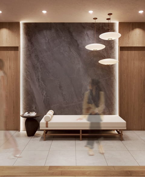 落ち着いた照明と大理石の壁が印象的なMoriLaboの待合スペース